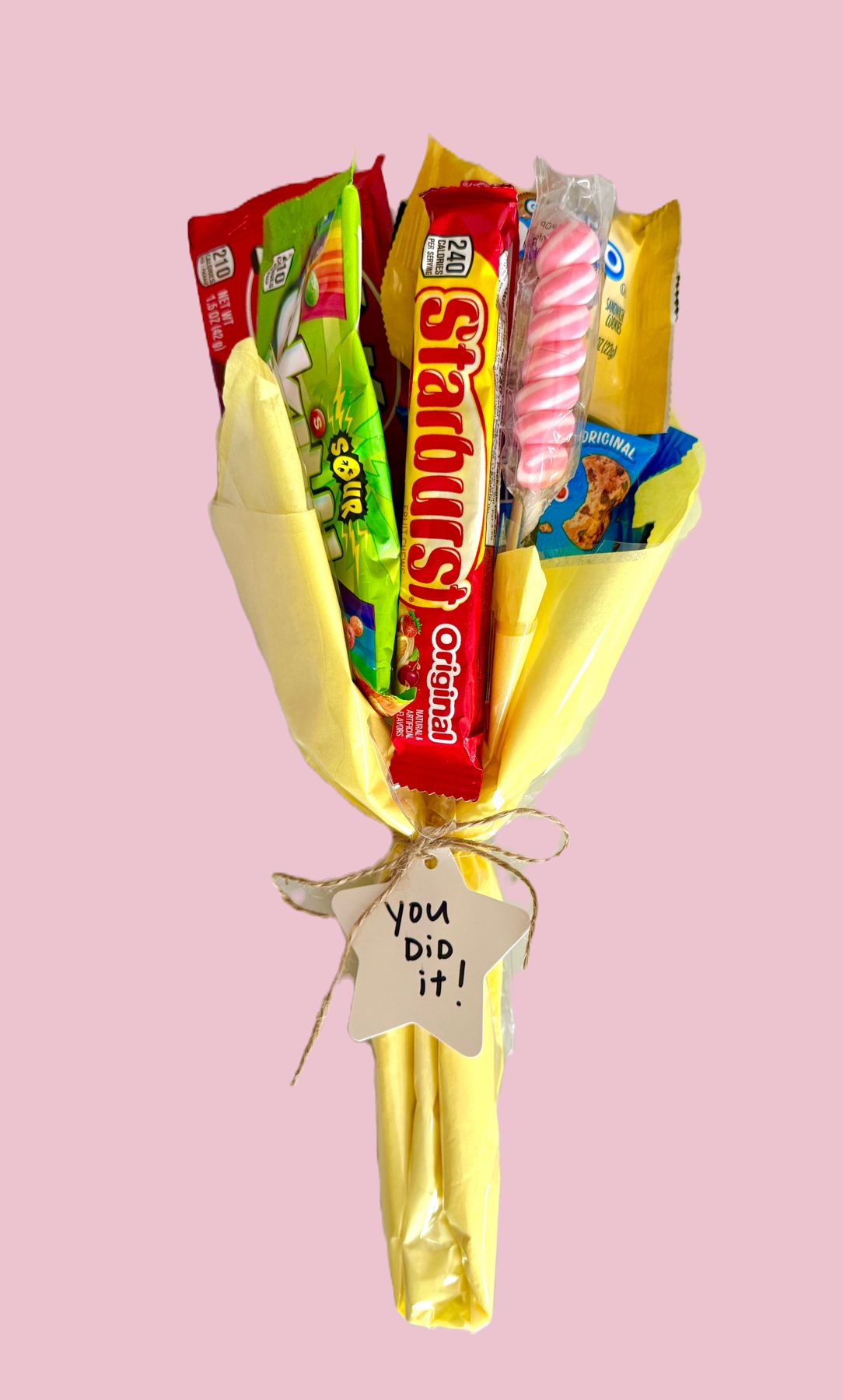 A bouquet of wrapped treats on sticks