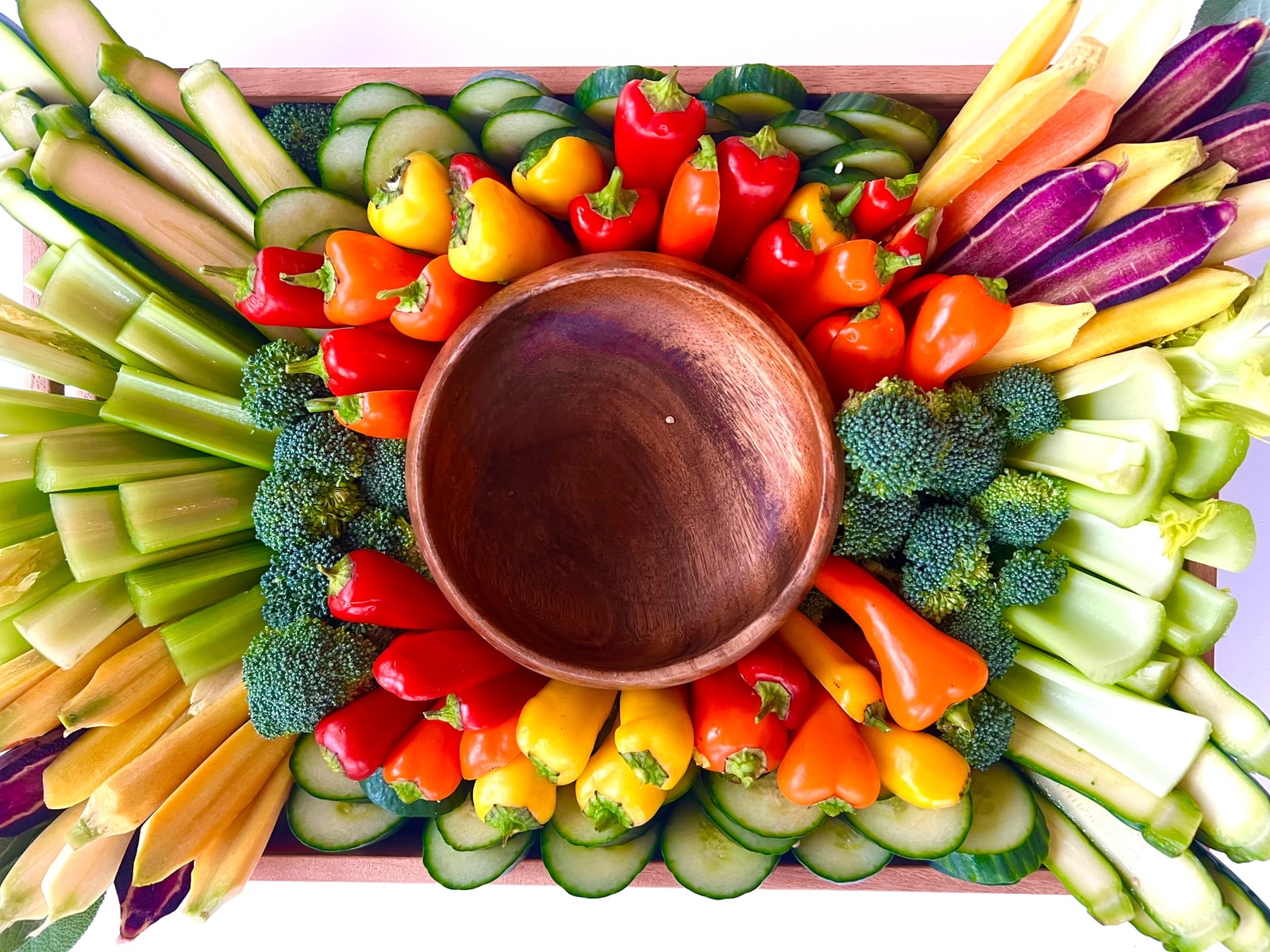 A vegetable board with homemade dip